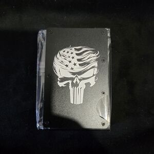 Metal minimalist RFID blocking wallet laser engraved Trump punisher.
